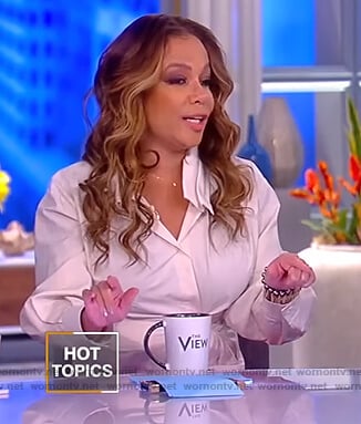 Sunny’s white gathered wrap blouse on The View