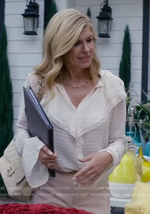 Debra's white sheer ruffle blouse on Dirty John