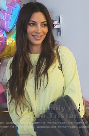 Kim’s yellow sweatshirt on Keeping Up with the Kardashians