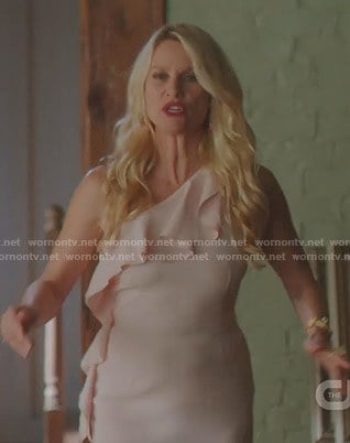 Alexis’s pink ruffle one shoulder dress on Dynasty