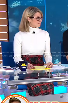 Amy’s white turtleneck sweater and plaid skirt on Good Morning America