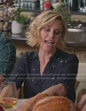 Claire’s navy star print blouse on Modern Family