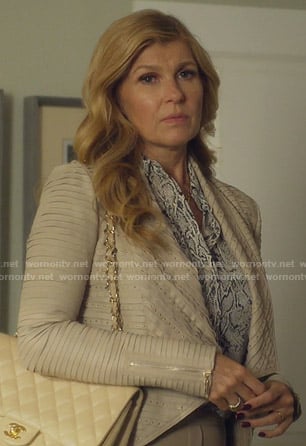 Debra's snake print blouse and studded draped jacket on Dirty John