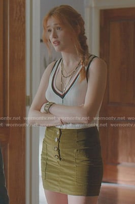 Kirby's white ribbed top and green mini skirt on Dynasty