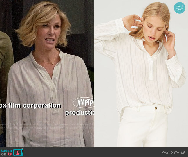 Club Monaco Maira Shirt worn by Claire Dunphy (Julie Bowen) on Modern Family