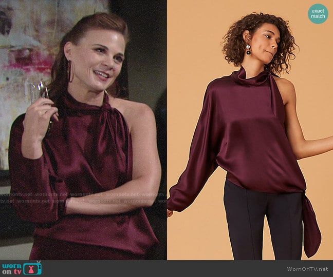 Diane von Furstenberg One Shoulder Knotted Blouse in Cabernet  worn by Phyllis Newman (Gina Tognoni) on The Young and the Restless