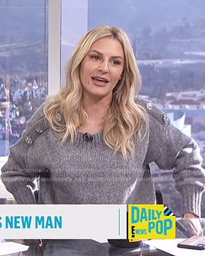 Morgan’s grey sweater with jeweled buttons on E! News Daily Pop