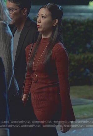 Tina’s red asymmetric ribbed sweater on Marvel’s Runaways