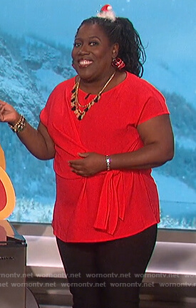 Sheryl’s red tie waist top on The Talk