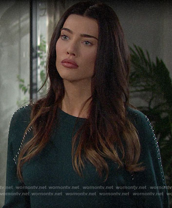 Steffy’s teal green sweater with metal rings on The Bold and the Beautiful
