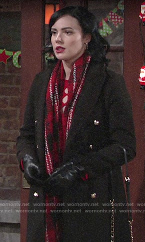 Tessa’s black coat and red plaid scarf on The Young and the Restless