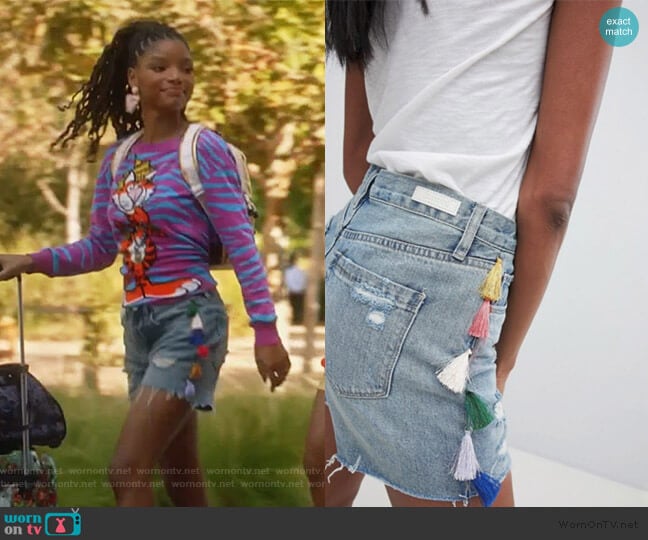 Boyfriend Denim Festival Shorts with Tassels by Blank NYC worn by Skylar Forster (Halle Bailey) on Grown-ish