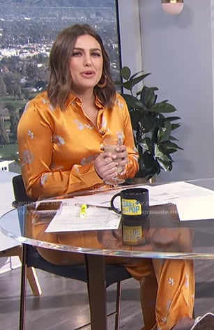 Carissa’s orange floral blouse and pants on E! News Daily Pop