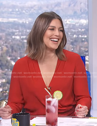 Carissa's red wrap blouse on E! News Daily Pop