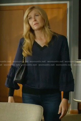 Debra's navy v-neck balloon sleeve top on Dirty John