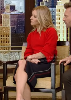 Kelly’s red sweater and pencil skirt with red and white stitching on Live with Kelly and Ryan