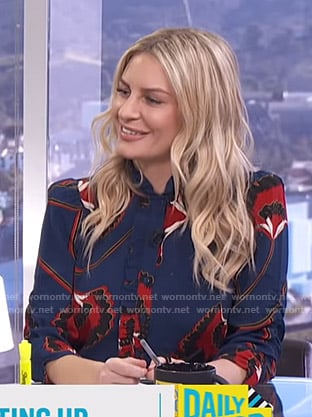 Morgan's blue floral ruffled blouse on E! News Daily Pop