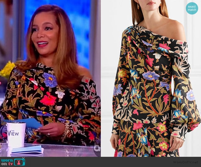 Floral and foliage-print asymmetric crepe blouse by Peter Piloto worn by Sunny Hostin on The View