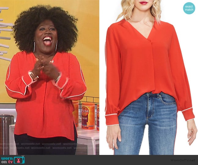 Piped Sleeve Top by Vince Camuto worn by Sheryl Underwood on The Talk