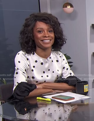 Zuri’s white polka dot ruffled sleeve top on E! News Daily Pop