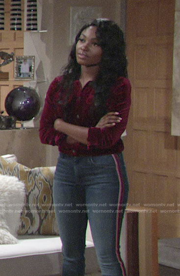 Ana’s red velvet jacket and side striped jeans on The Young and the Restless