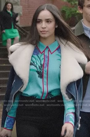 Ava’s turquoise blue floral shirt with red trim and denim jacket with shearling collar on PLL The Perfectionists