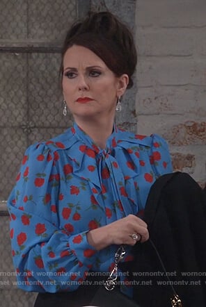 Karen’s blue rose print tie neck blouse on Will and Grace