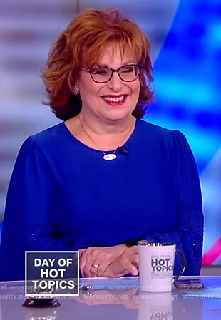 Joy’s blue embellished sleeves blouse on The View