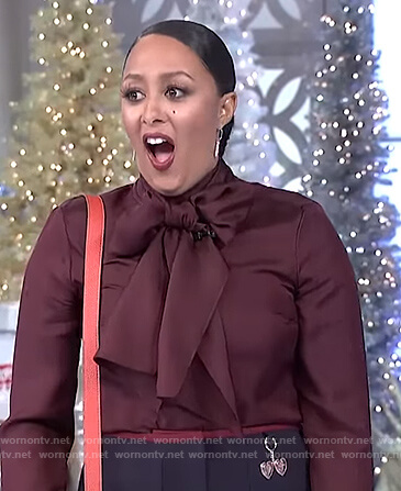Tamera’s maroon tie neck sweater on The Real