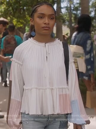 Zoey’s white pleated colorblock blouse on Grown-ish