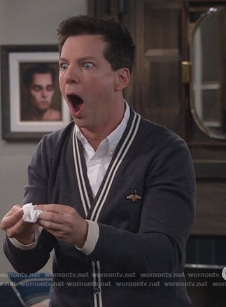Jack’s navy contrast stripe cardigan on Will and Grace