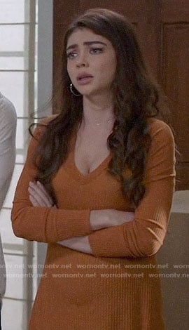 Haley’s mustard textured tunic top on Modern Family
