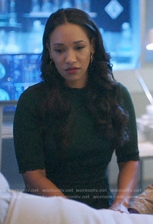 Iris’s dark green pleated dress on The Flash