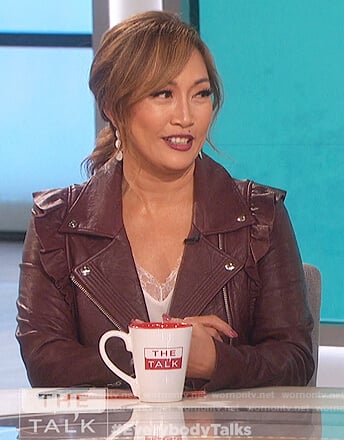 Carrie’s burgundy ruffled moto jacket on The Talk