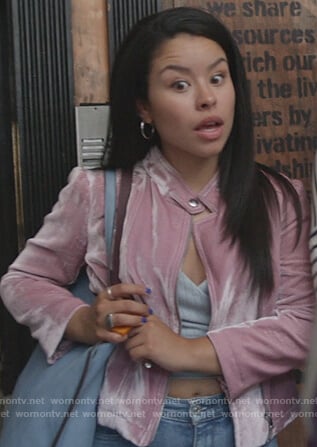 Mariana’s pink velvet moto jacket and blue wrap top on Good Trouble