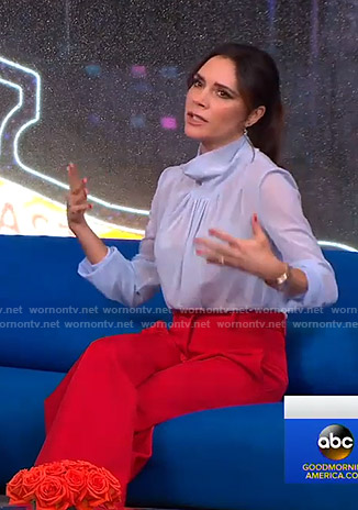Victoria Beckham’s blue sheer top and red pants on Good Morning America