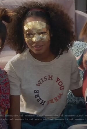 Zoey’s white wish you were here graphic tee on Grown-ish