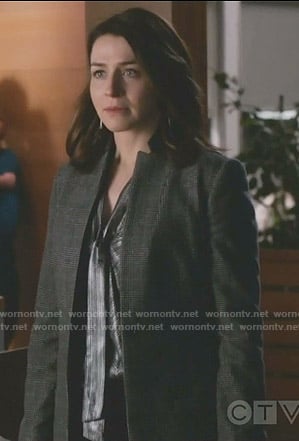 Amelia's metallic tie neck top and checked coat on Grey's Anatomy