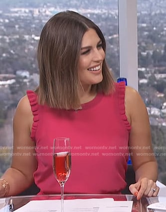 Carissa’s pink ruffled crew-neck top on E! News