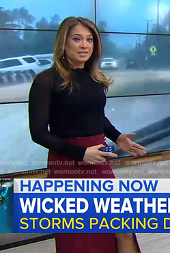 Ginger’s black sweater and red slit skirt on Good Morning America