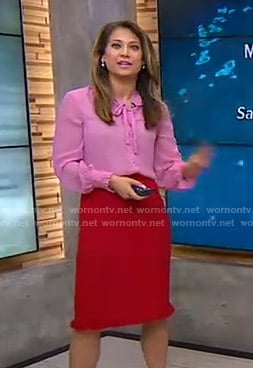 Ginger’s pink tie neck blouse and red tweed skirt on Good Morning America