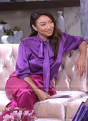 Jeannie's purple blouse and pink satin pants on The Real