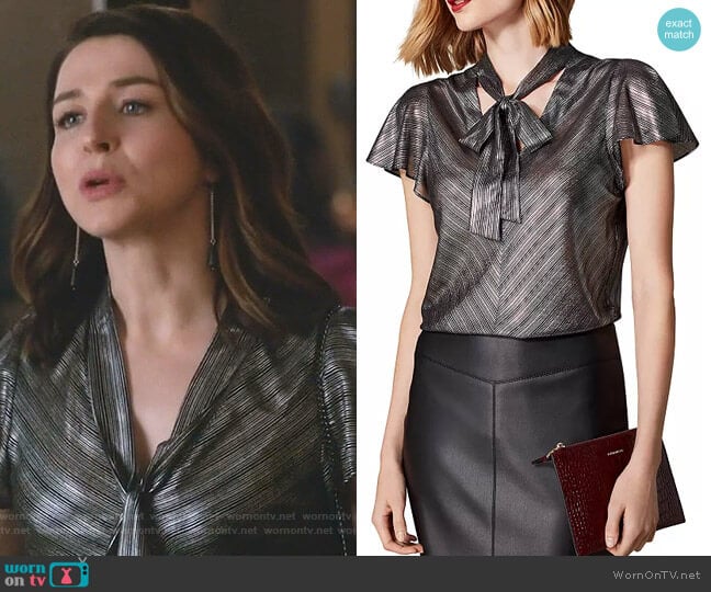 Metallic Striped Tie-Neck Top by Karen Millen worn by Amelia Shepherd (Caterina Scorsone) on Greys Anatomy