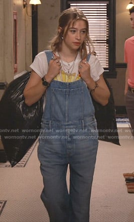 Shannon's white graphic tee and denim overalls on Fam