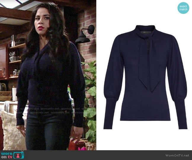 WornOnTV Mia s navy tie neck sweater on The Young and the Restless Noemi Gonzalez Clothes and Wardrobe from TV