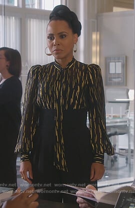 Tegan’s black metallic tie neck blouse on How to Get Away with Murder