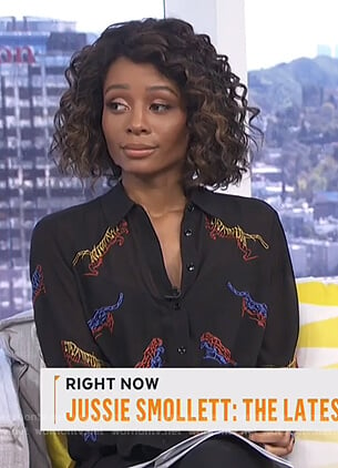 Zuri’s black tiger embroidered blouse on Live from E!