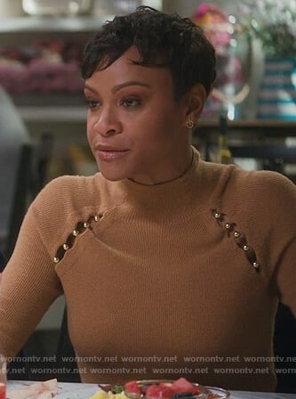 Angela's brown cutout embellished sweater on American Housewife