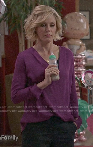 Claire’s purple wrap blouse on Modern Family