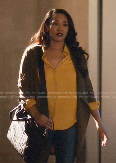 Iris's green draped jacket on The Flash